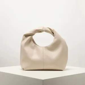 Sculpted Handle Handbag: Modern Elegance