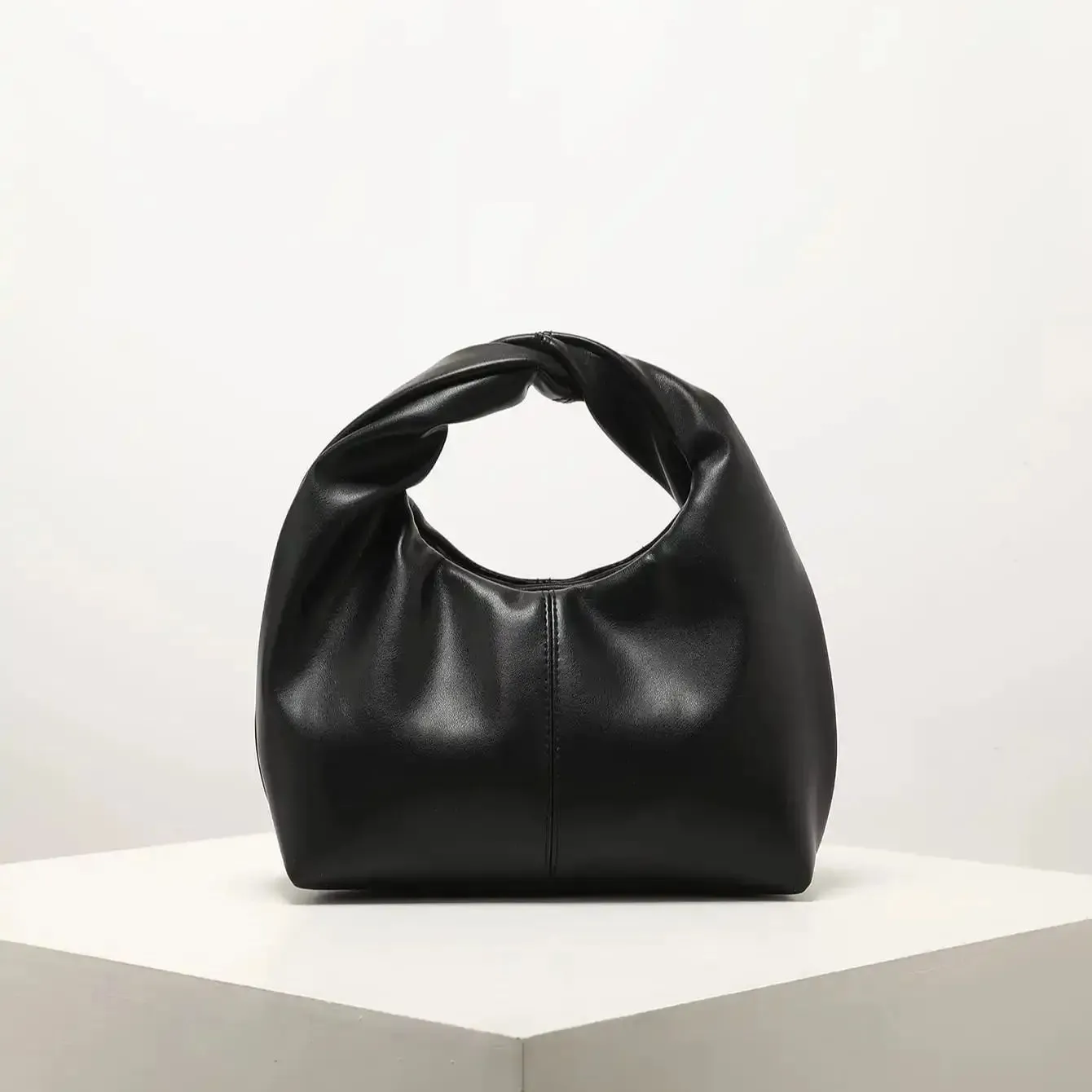 Sculpted Handle Handbag: Modern Elegance